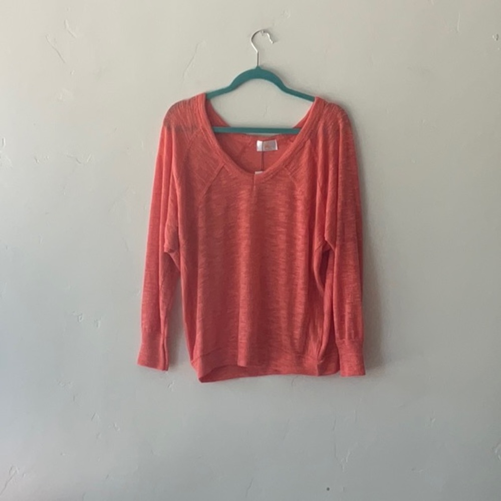 Orange sweater by sunny days boutique. Sizes S/M. Great summer sweater.